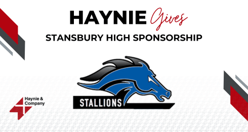 Haynie sponsors Stansbury High; blue stallion logo featured prominently.