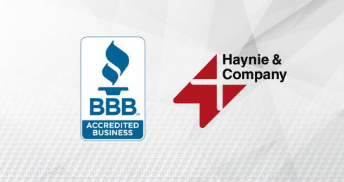 BBB Accredited Business and Haynie logos on a textured, geometric background.