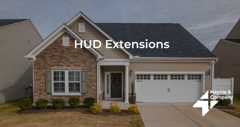 Modern suburban home with stone accents and HUD Extensions text overlay, Haynie logo.