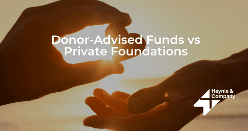 Hands reaching out with text Donor-Advised Funds vs Private Foundations and Haynie logo.