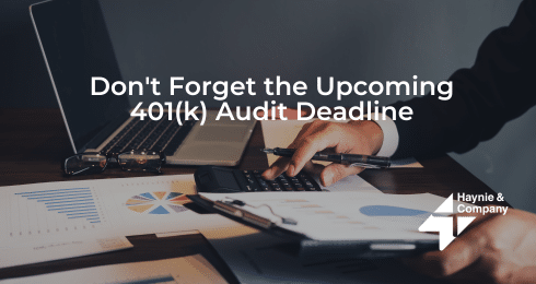Person working on 401(k) audit with charts, laptop, calculator; text: Don't Forget the Upcoming 401(k) Audit Deadline.