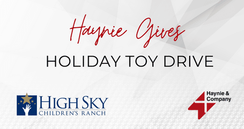 Haynie Gives Holiday Toy Drive banner with logos of High Sky Children's Ranch and Haynie.