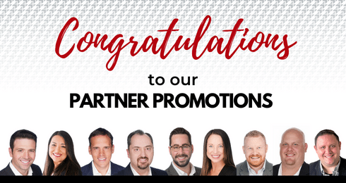 Congratulations to our partner promotions announcement with nine people smiling below.