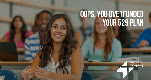Smiling woman in a classroom with text Oops, you overfunded your 529 plan by Haynie.