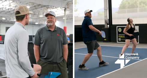 Pickleball game and conversation; two men talking, one man and woman playing indoors. Haynie logo visible.