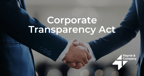 Handshaking under the Corporate Transparency Act text, with Haynie logo.