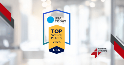 USA Today Top Workplaces 2025 award badge with Haynie logo on a blurred background.