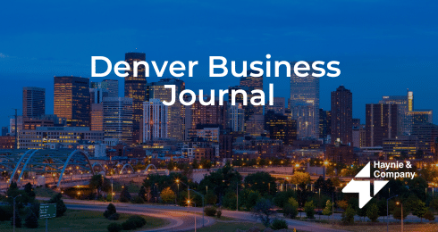 Denver skyline at dusk with Denver Business Journal and Haynie logos.