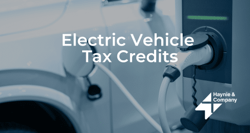 Electric vehicle charging, promoting tax credits with Haynie logo in the image.
