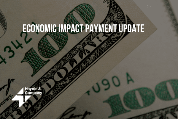 100 dollar bills with text 'Economic Impact Payment Update' from Haynie.