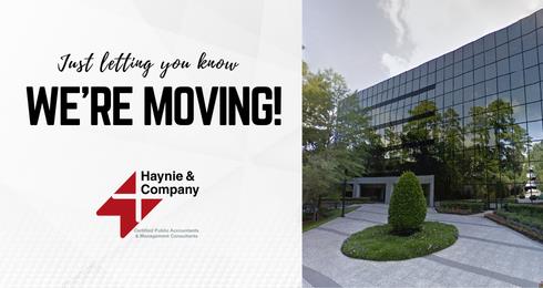 Haynie announces office move with building exterior view.