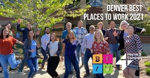 Group of people jumping and smiling, celebrating Denver Best Places to Work 2021 with Haynie logo.