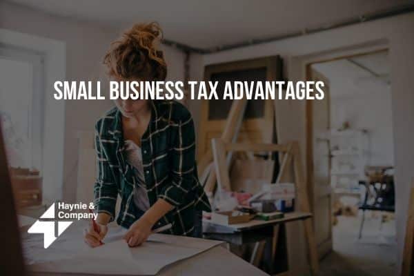Small business owner working in studio with text overlay Small Business Tax Advantages by Haynie.
