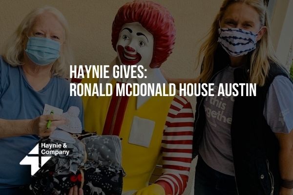 Haynie supports Ronald McDonald House Austin with donations, featuring two women and Ronald McDonald statue.
