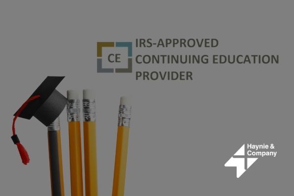 IRS-approved continuing education provider with pencils and a graduation cap. Haynie logo.