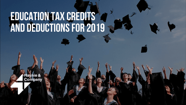 Graduates tossing caps in celebration under a blue sky, with text on education tax credits and deductions for 2019.