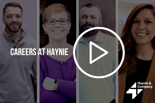 Careers at Haynie promotional image with four employees, featuring play button and Haynie logo.