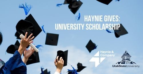 Graduates throwing caps in the air at the Haynie Gives: University Scholarship event, Utah State University logo.