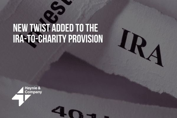 New twist on IRA-to-charity provision text with torn paper background, Haynie logo visible.