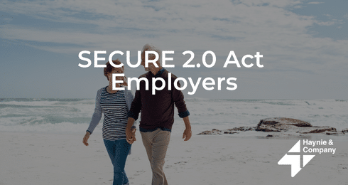 A man and woman walking on a beach under SECURE 2.0 Act Employers text, with Haynie logo.