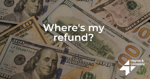 U.S. dollar bills with the text Where's my refund? and Haynie logo.
