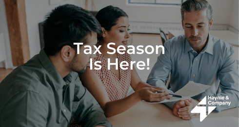 Tax season advisory meeting with Haynie team discussing documents.