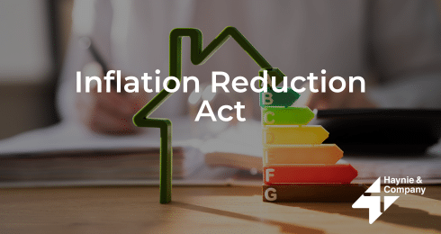 Inflation Reduction Act text with energy efficiency chart and Haynie logo.