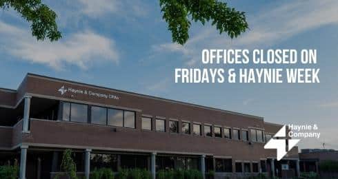 Haynie building with sign: Offices closed on Fridays & Haynie Week.