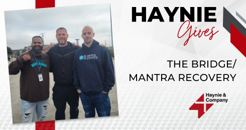 Individuals from Mantra Recovery pose together at a Haynie event.