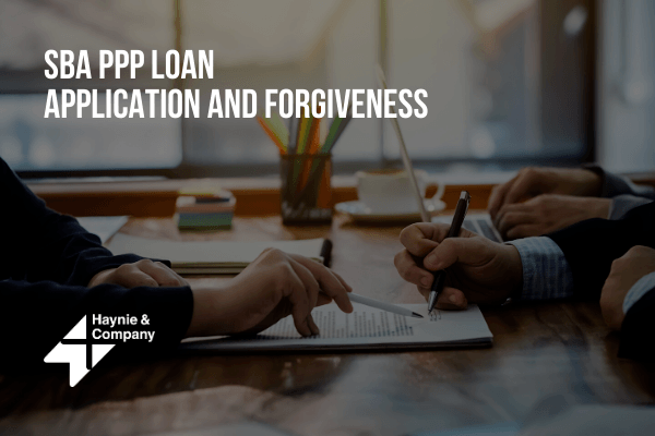 SBA PPP loan application process at a desk with Haynie branding.