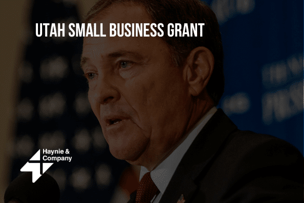 A man speaking at a Utah Small Business Grant event hosted by Haynie.